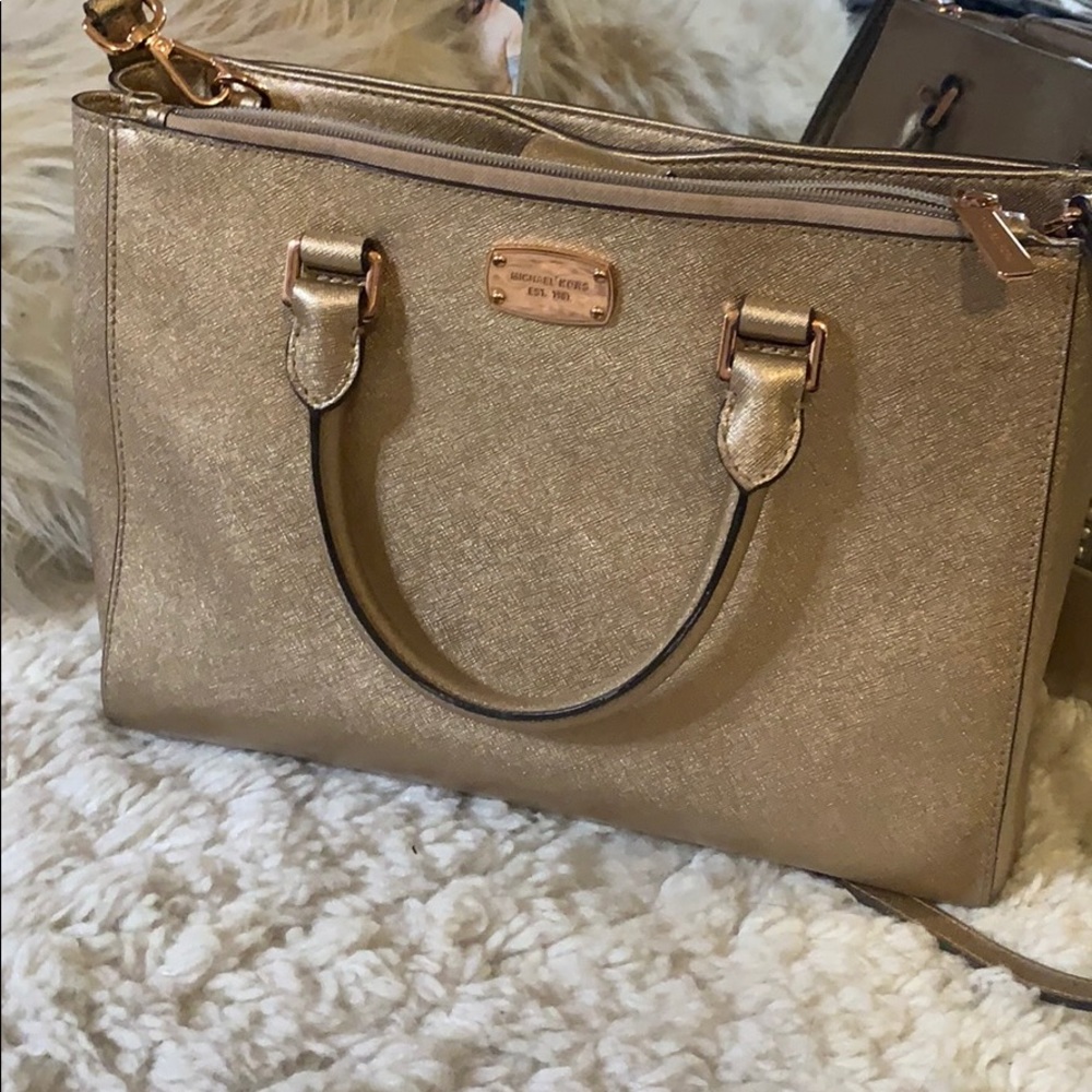 MK rose gold purse